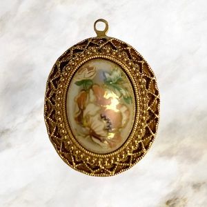 Vintage gold tone floral locket